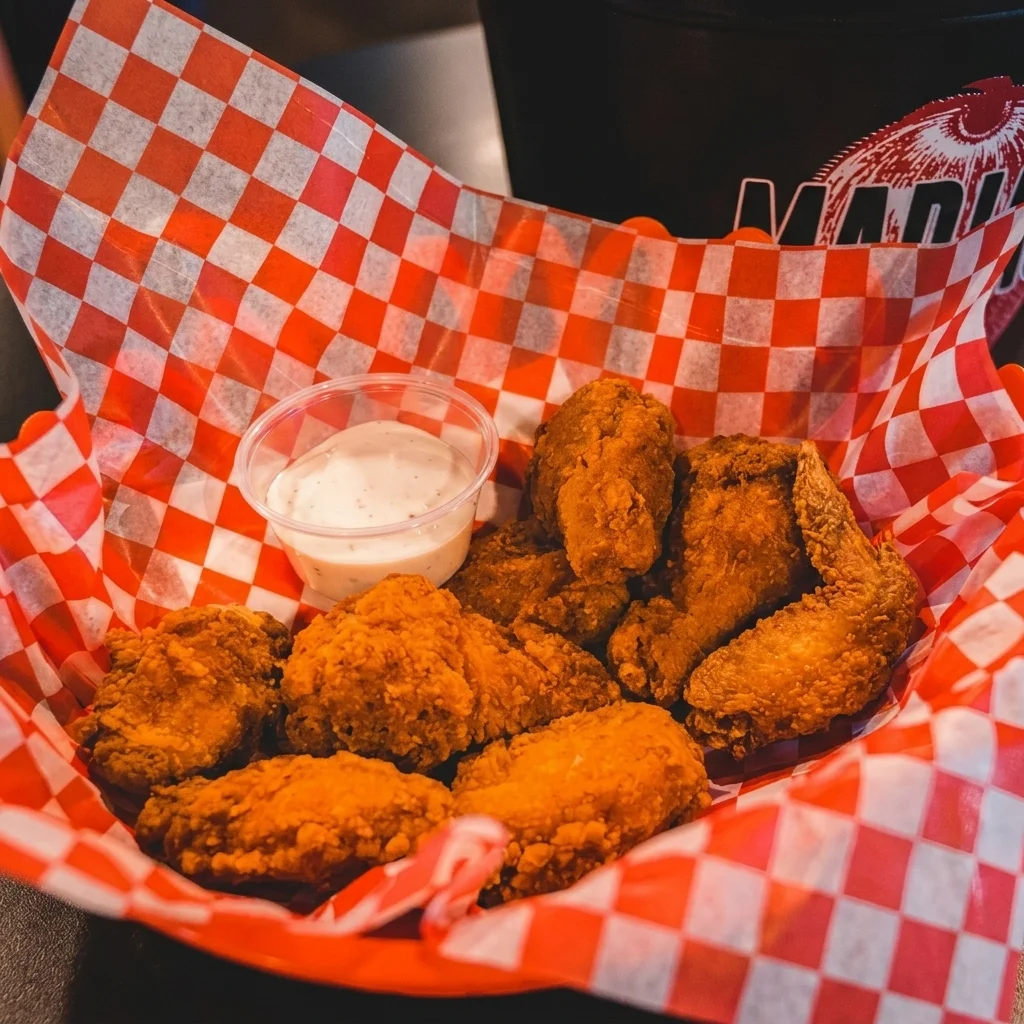 Saucy chicken wings at Sargent Flying Pizza in Winnipeg West End, MB